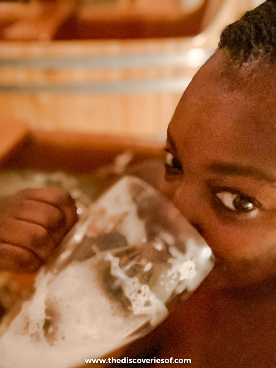 Julianna Barnaby bathing and drinking in beer